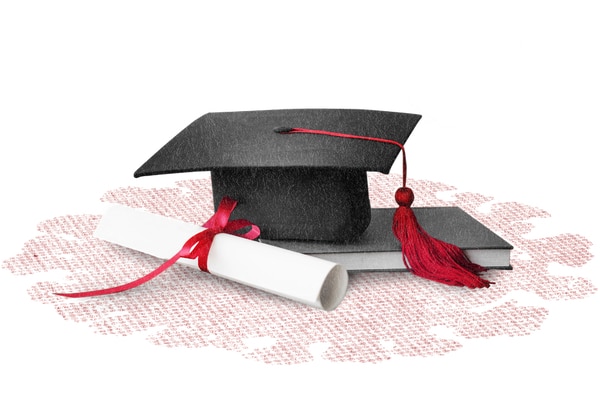 graduation cap and scroll on book on red splash background