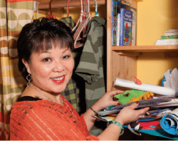 Linda Chu organizing a messy shelving unit easing the chaos in your home