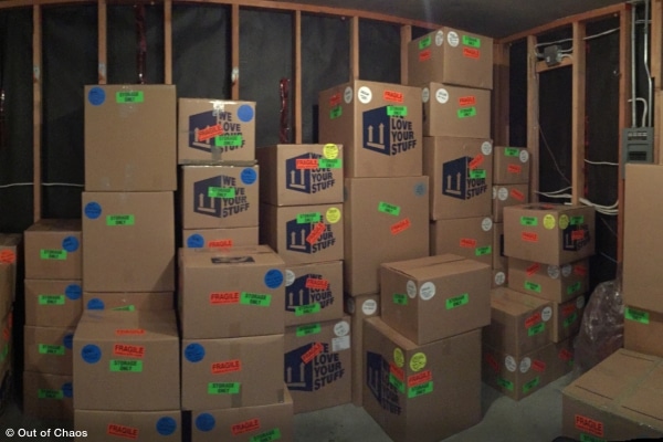 moving boxes piled up in a storage area representing packing supplies