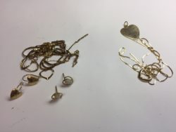 tangled pile of 10K and 14K gold jewellery