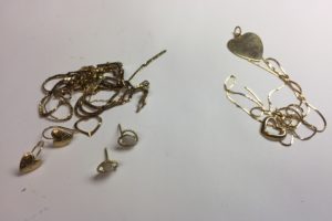 tangled pile of 10K and 14K gold jewellery
