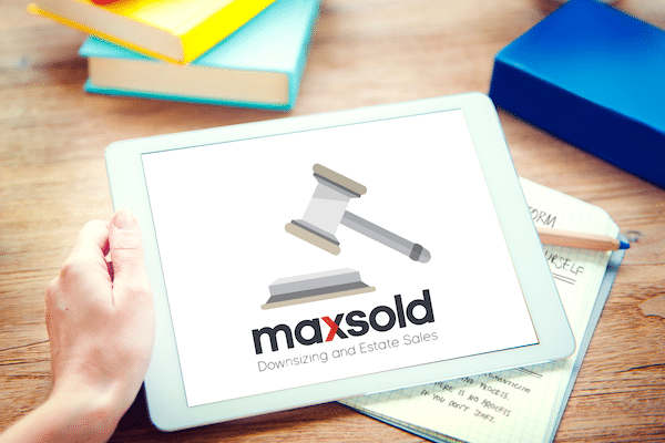 maxsold logo on ipad answers to common downsizing questions