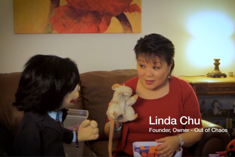 Lil Chu and Linda Chu demonstrating how to organize toys