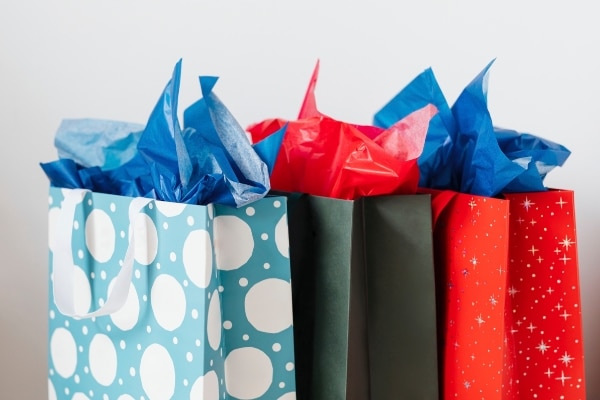 holiday gift bags representing frequent shopper