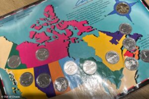 Canadian coin collection showing one coin on each province plus a one-dollar coin